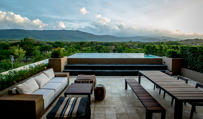 A spectacular rooftop penthouse to enjoy a panoramic view of mountain and verdant green forest.